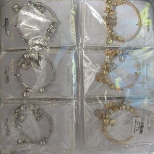 Elegant Silver and Gold Charm Bracelets